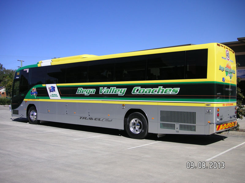 Yellow, green and silver coach with Bega Valley Coaches lettering